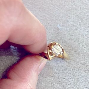 This is a vintage costume jewelry piece with a layer of gold on top.